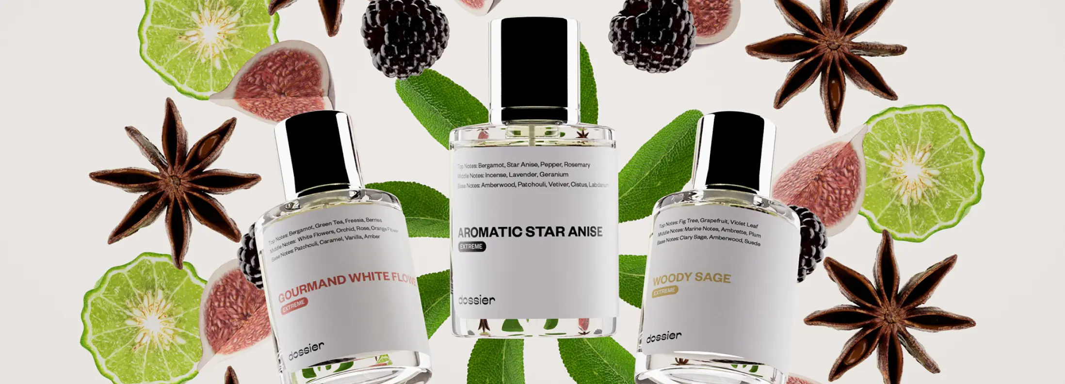 Three Dossier perfume bottles surrounded by bergamot, figs, blackberries, sage leaves, and star anise.