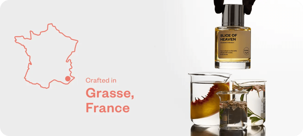 Dossier Slice of Heaven perfume crafted in Grasse, France, displayed above fragrance ingredients in laboratory beakers